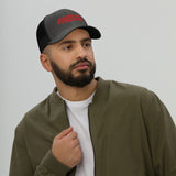 #Undefeated Trucker Cap